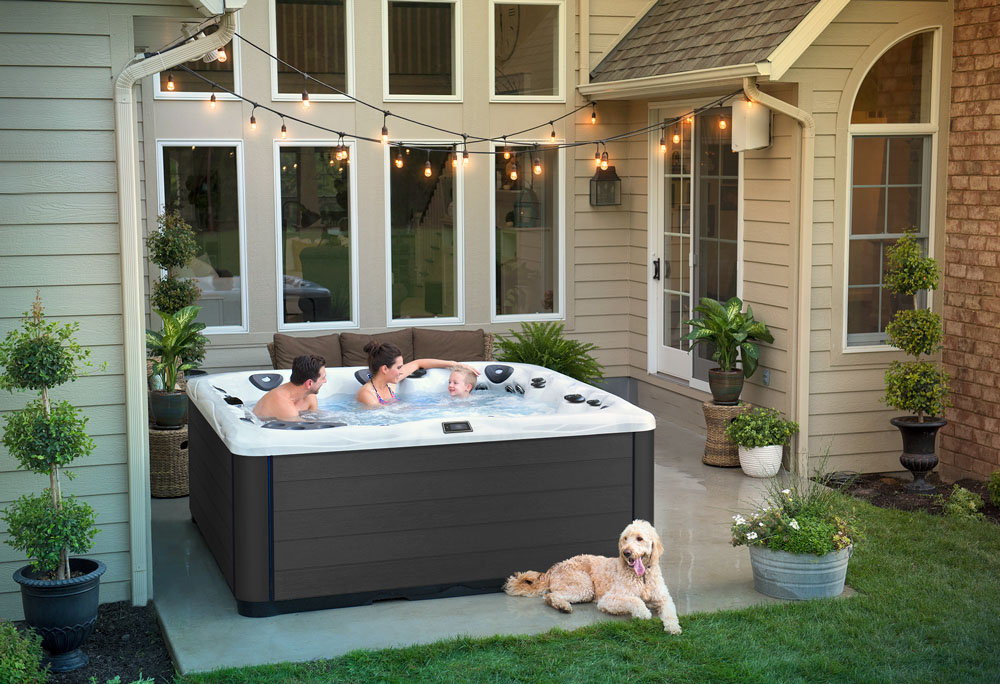 family enjoying hot tub