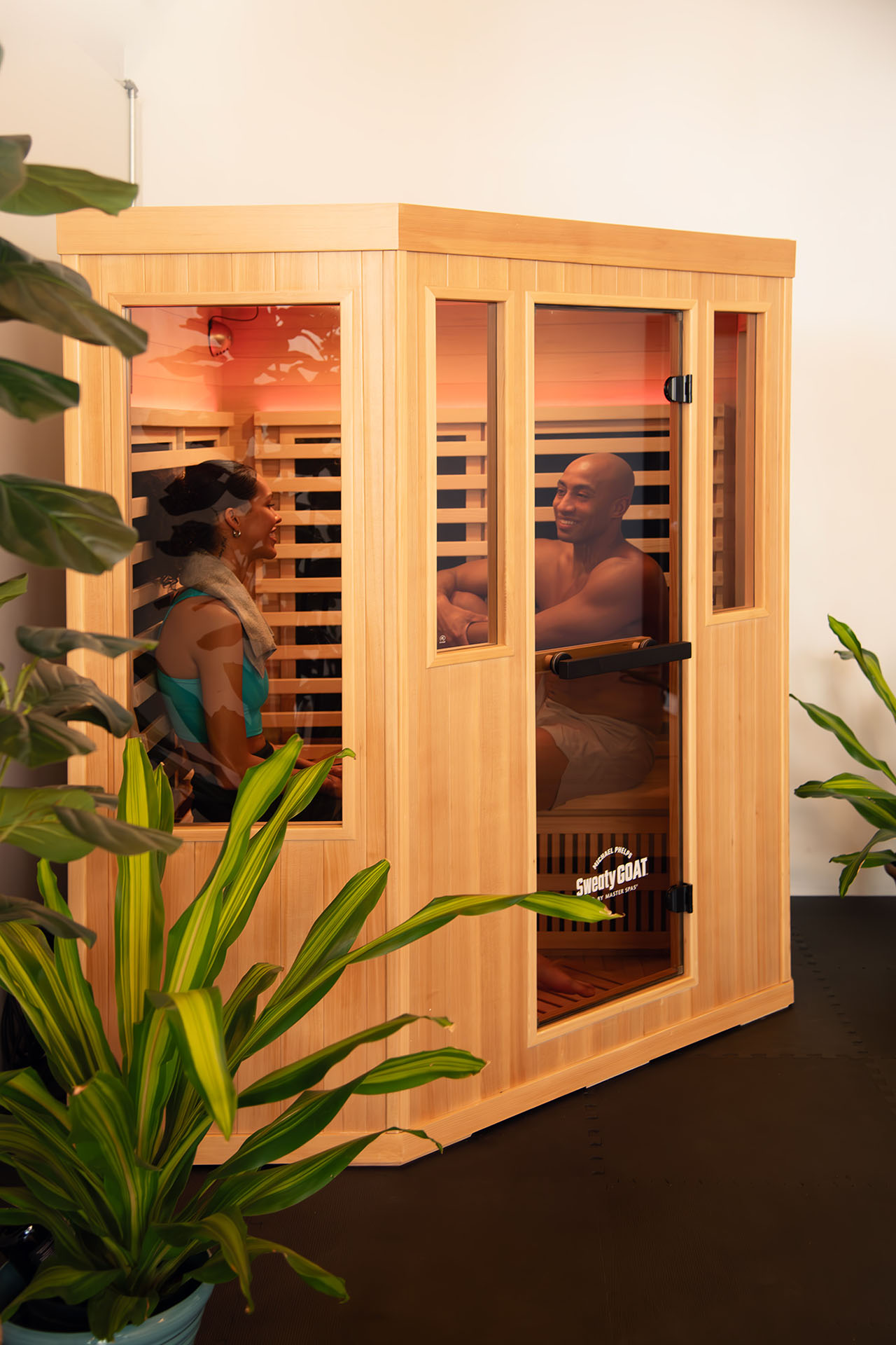 man and woman in sauna